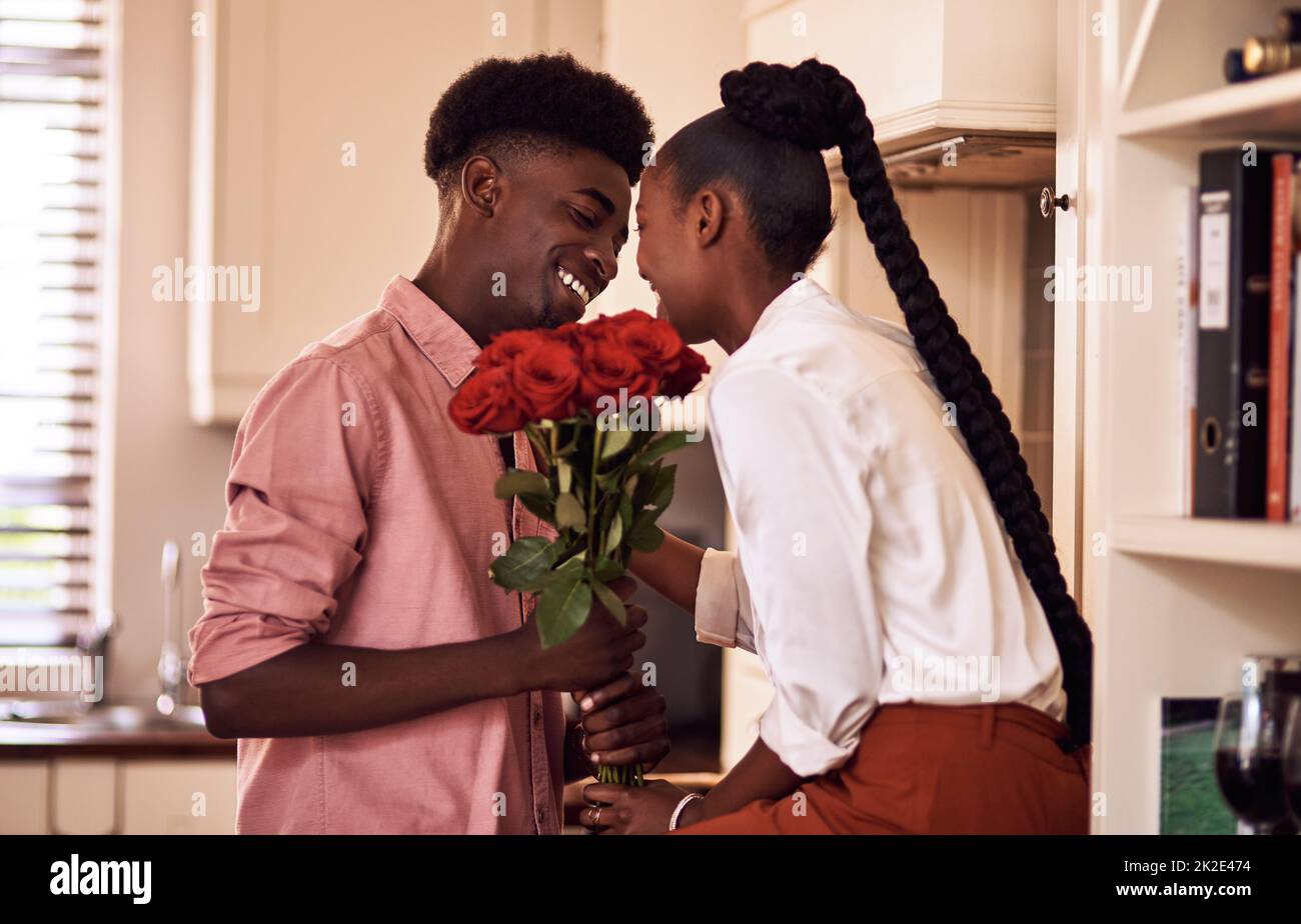 African american man giving flowers hires stock photography and images
