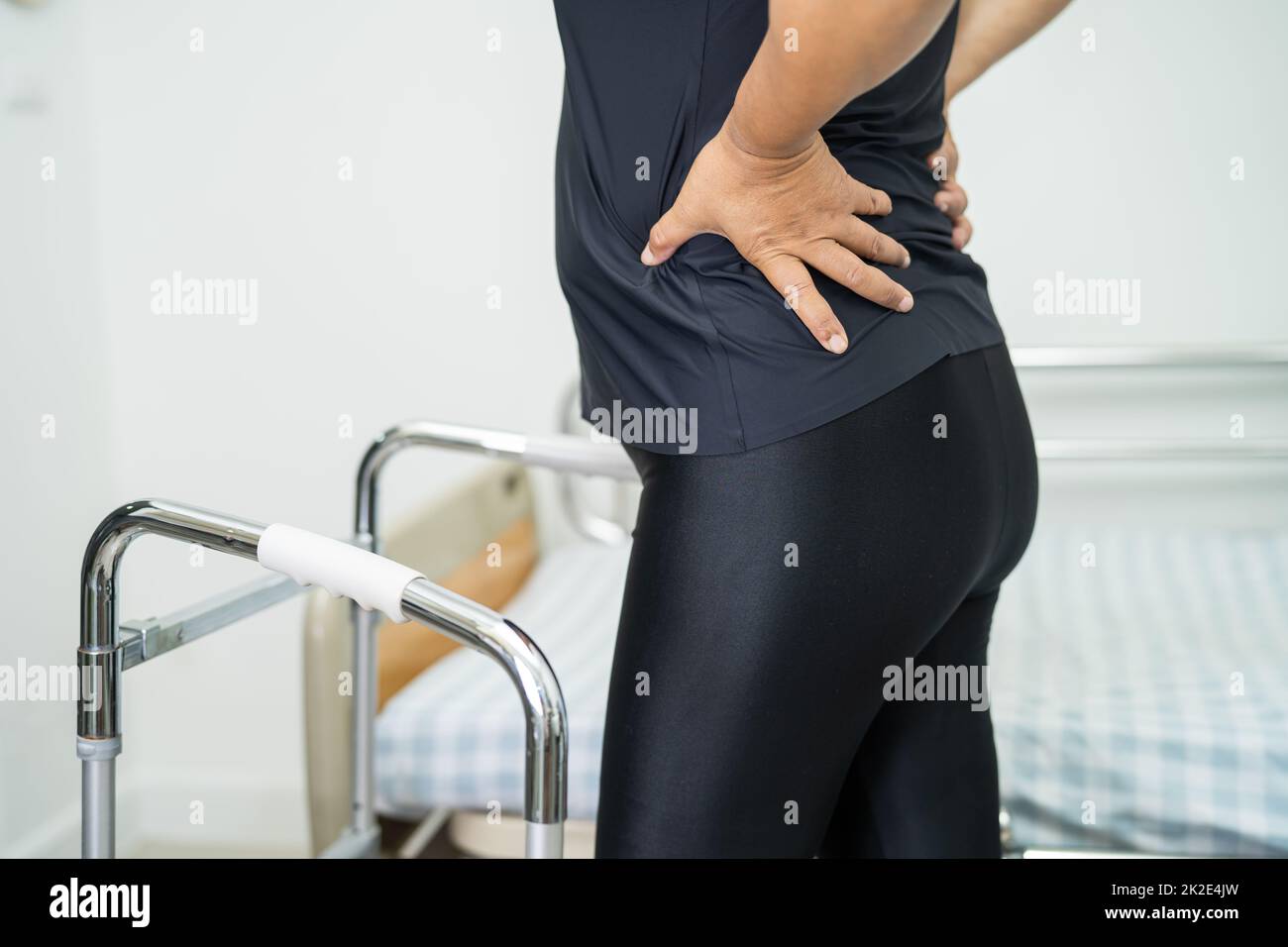 Asian lady patient pain her back, waist, leg and orthopedic lumbar with