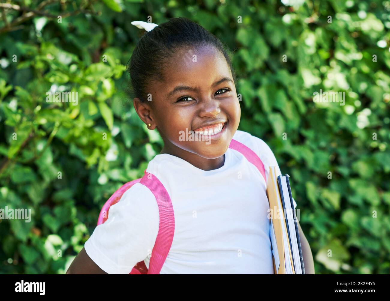 Excited for my first day of school. Shot of a little girl wearing a