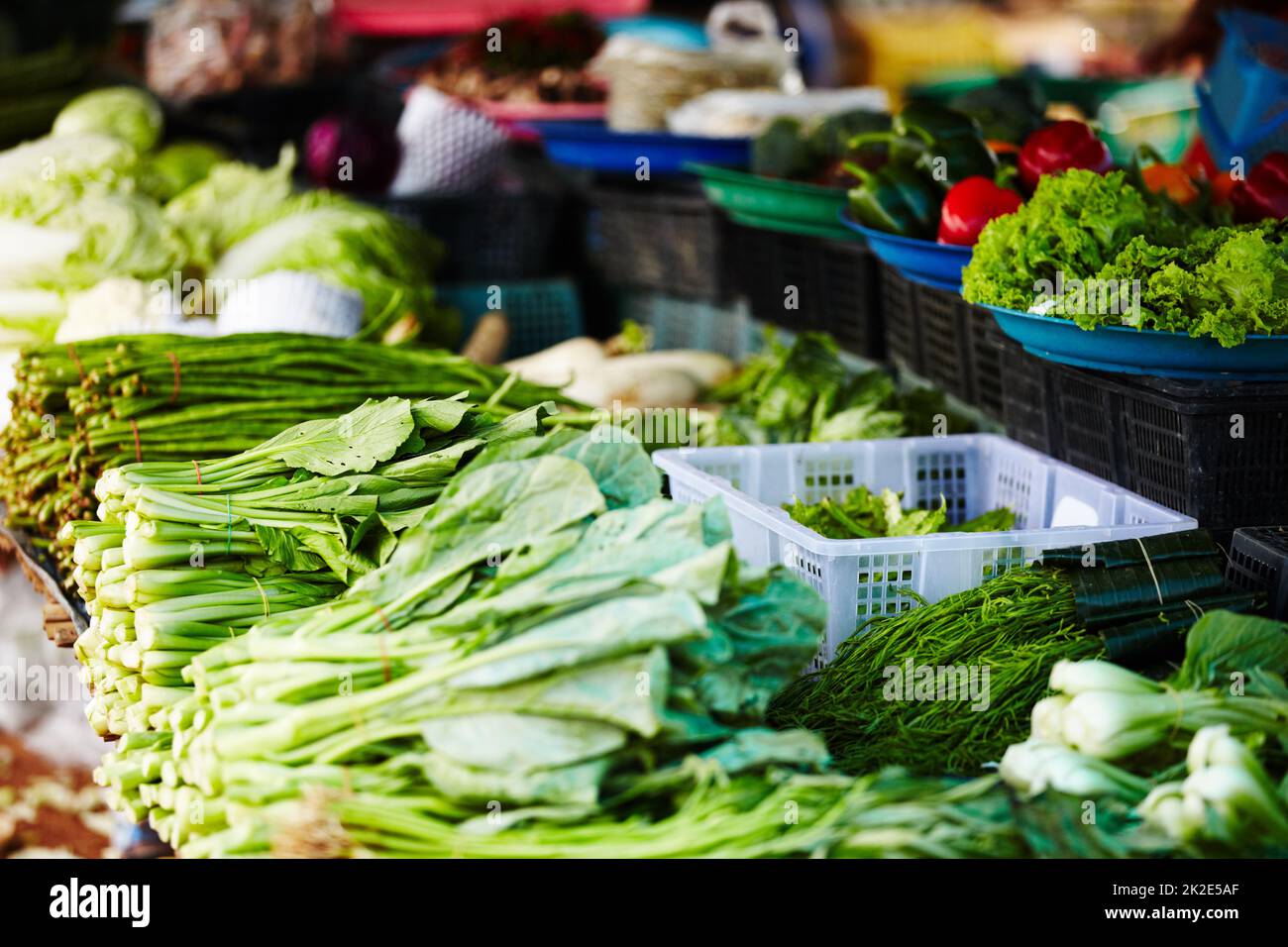 Local Thai vegetable stall. A stall in a Thai fresh food market packed