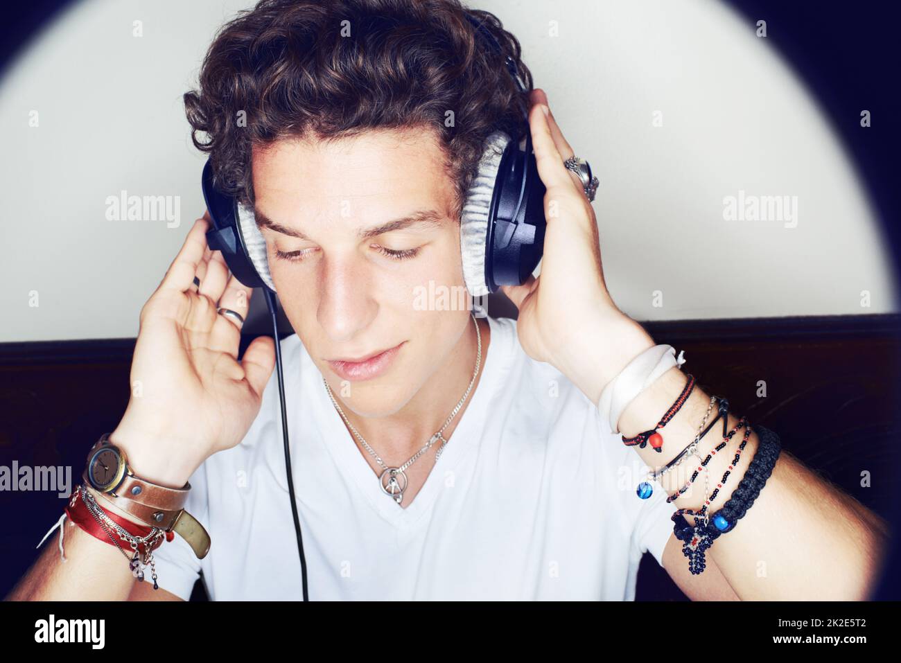 Rocking to the beat. Close up shot of a young man grooving to some