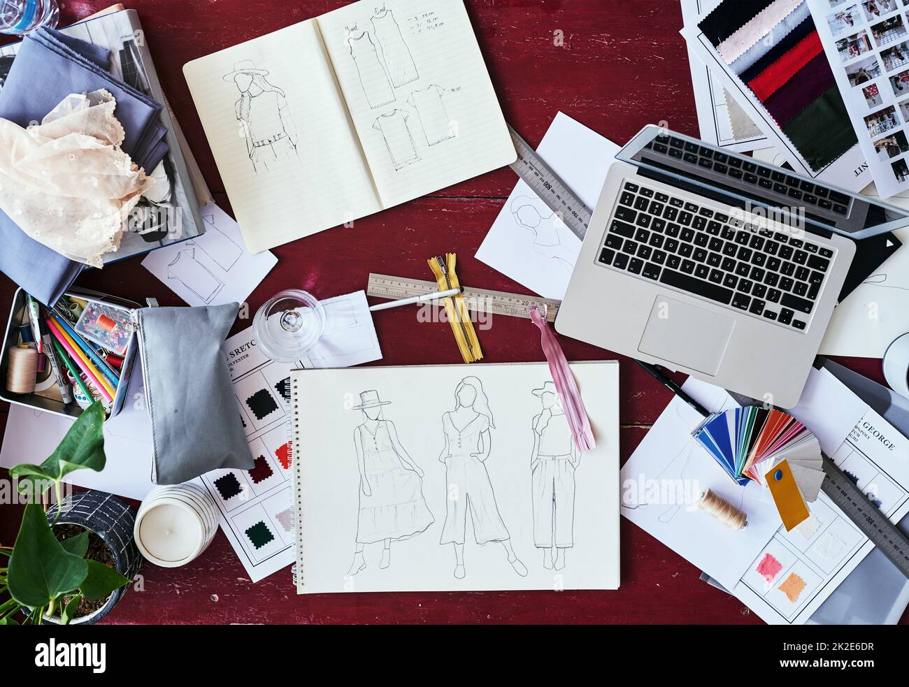 The life of a fashion designer. High angle shot of a fashion designers