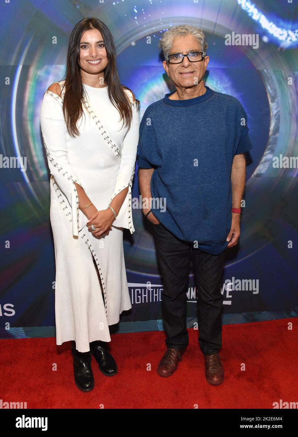 Hollywood, CA. September 22, 2022, Gabriella Wright and Deepak Chopra arriving to the Immersive Deepak Chopra: Journey to Self at Lighthouse Artspace LA on September 22, 2022 in Hollywood, CA. © OConnor/AFF-USA.com Stock Photo