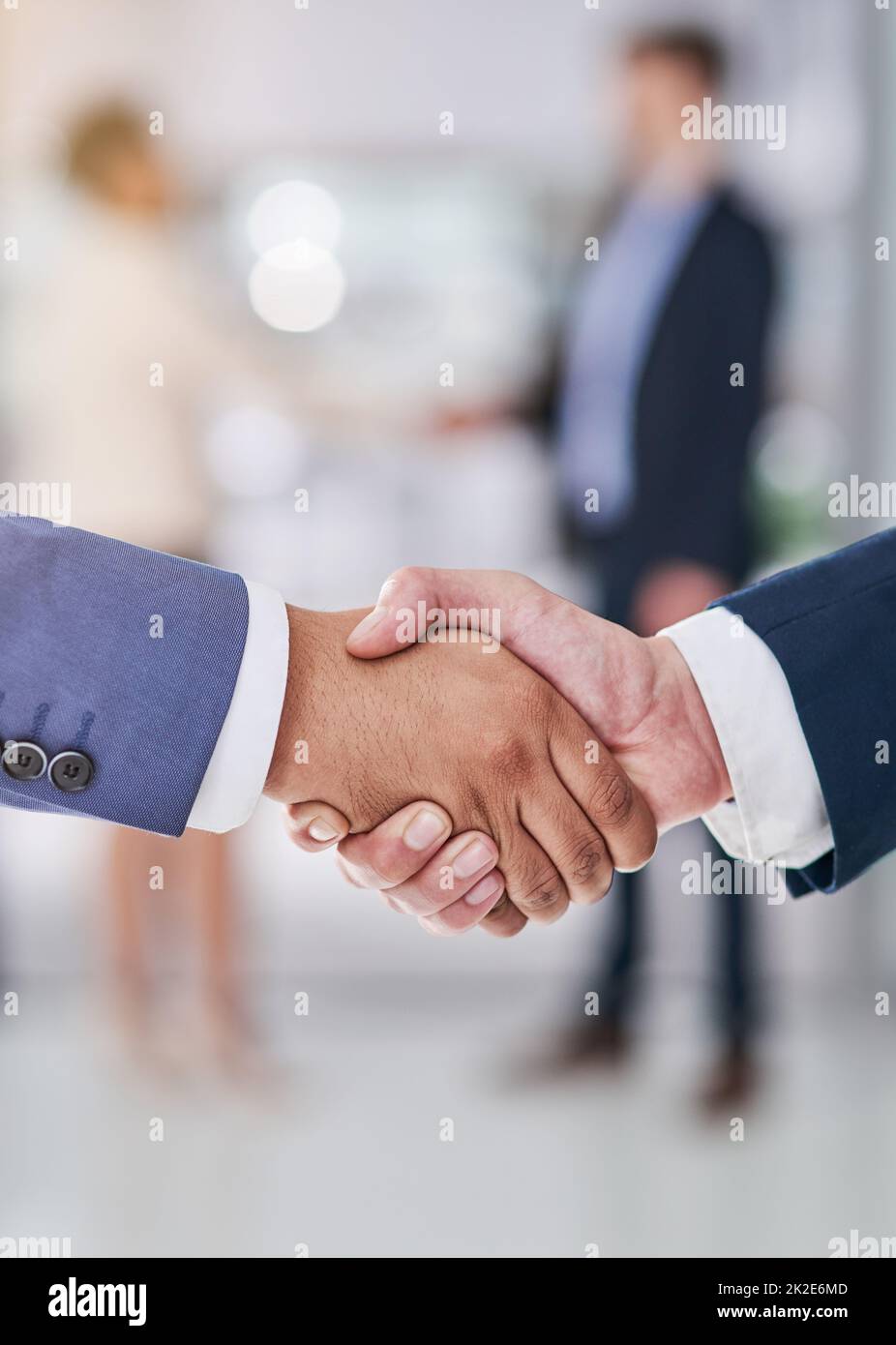 Company collaborations. Shot of businesspeople shaking hands. Stock Photo