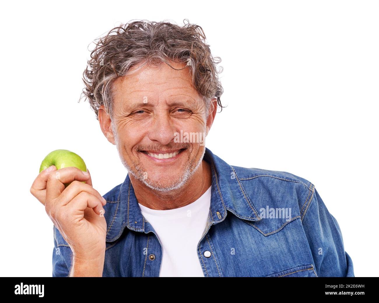 Get your green on. Studio shot of a mature man isolated on white. Stock Photo