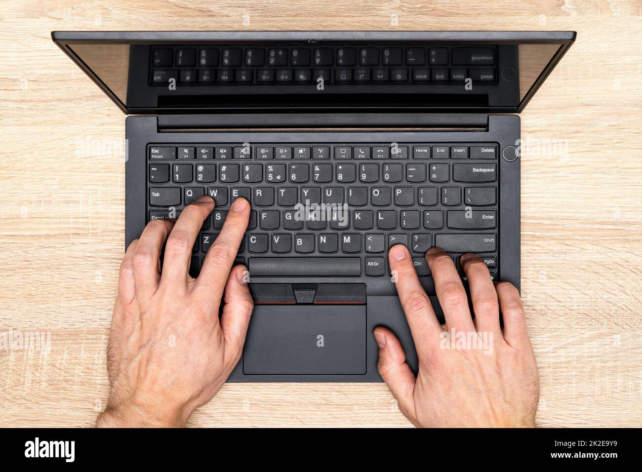 Hands of young contemporary office manager over laptop keypad Stock Photo