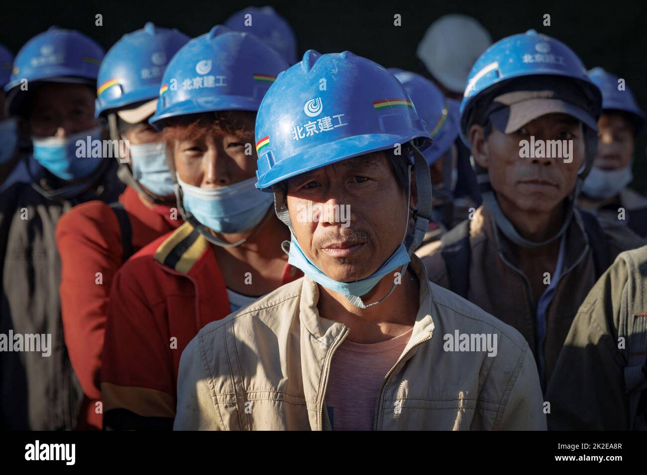 Workers gather to begin their shift at the construction site of the new Workers' Stadium in Beijing, China, September 23, 2022. REUTERS/Thomas Peter     TPX IMAGES OF THE DAY Stock Photo