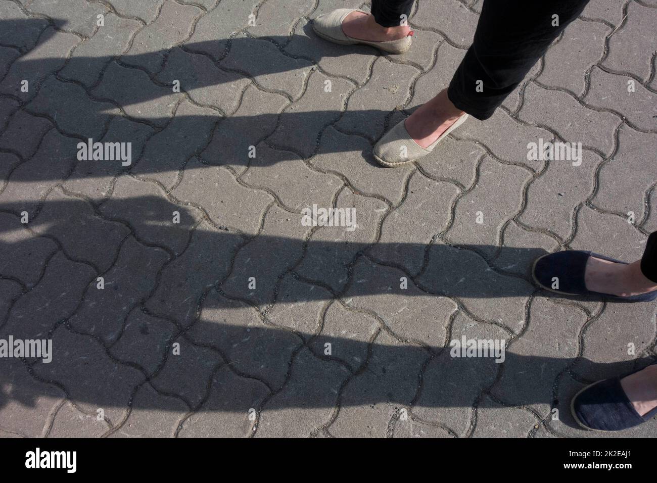 person standing on the feet Stock Photo