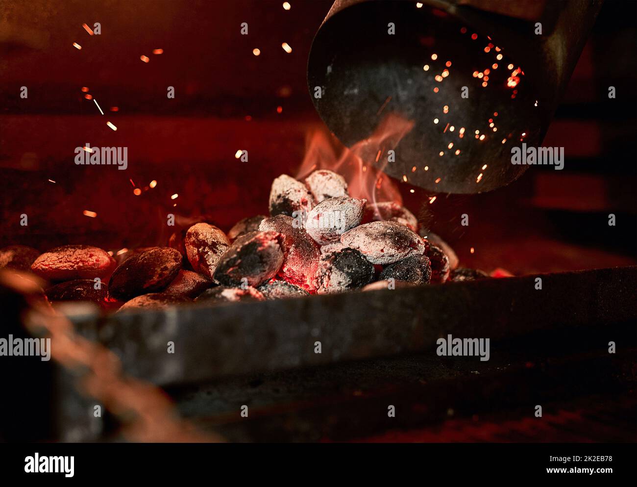 Theres nothing like the smell of a charcoal grill being fired up. Closeup shot of charcoal