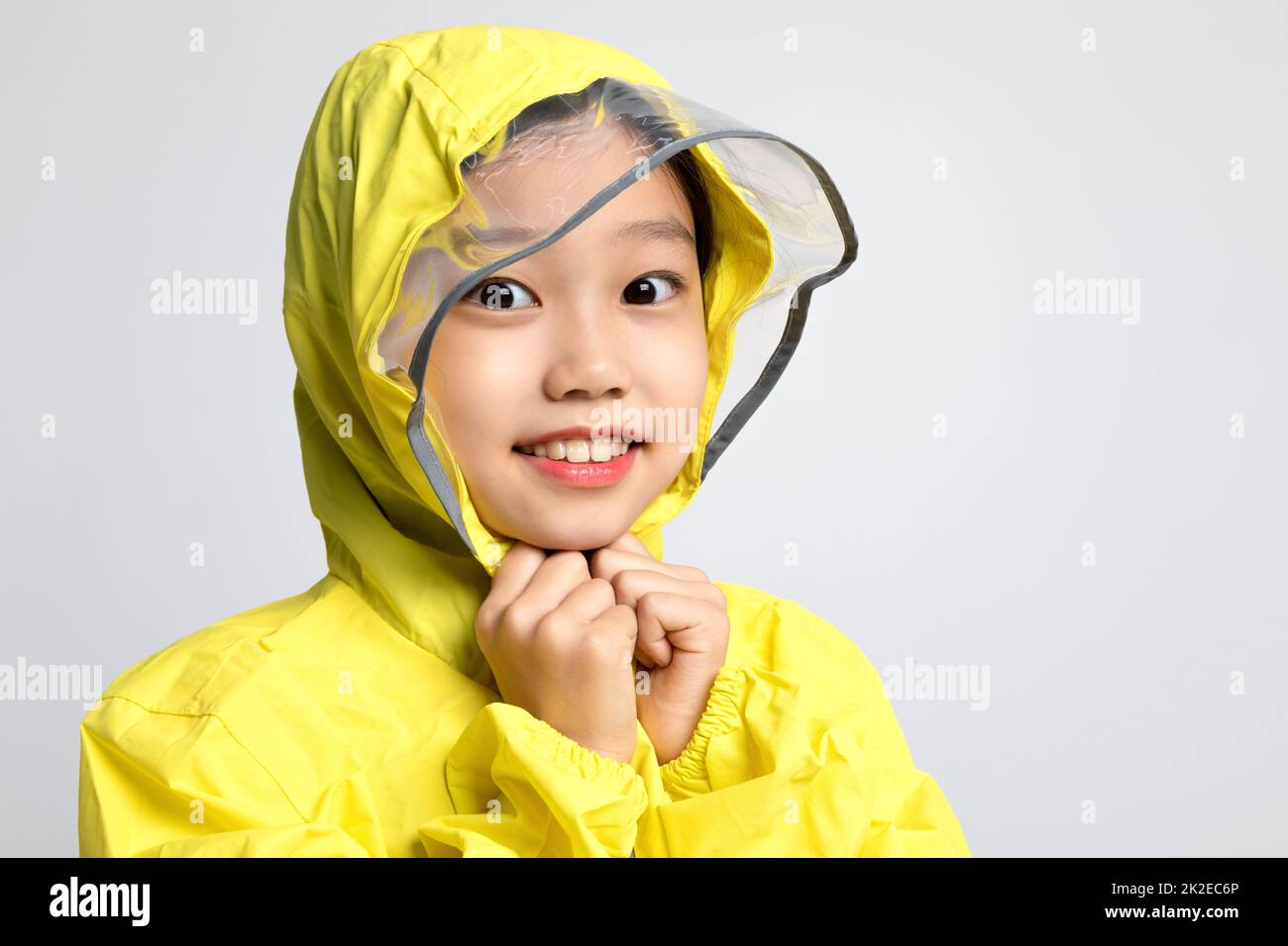 cute young Korean girl, rainy season concept in white background studio