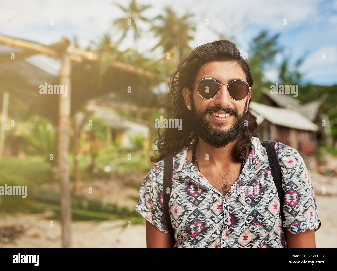 Nothing but blue skies ahead. Portrait of a happy young traveler taking