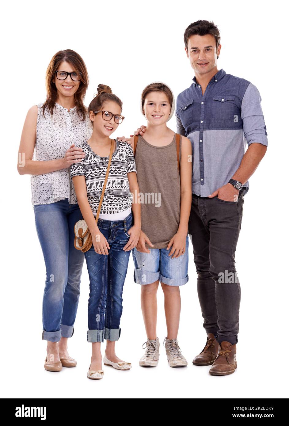 Go hip or go home. Studio shot of trendy young family against a white background. Stock Photo