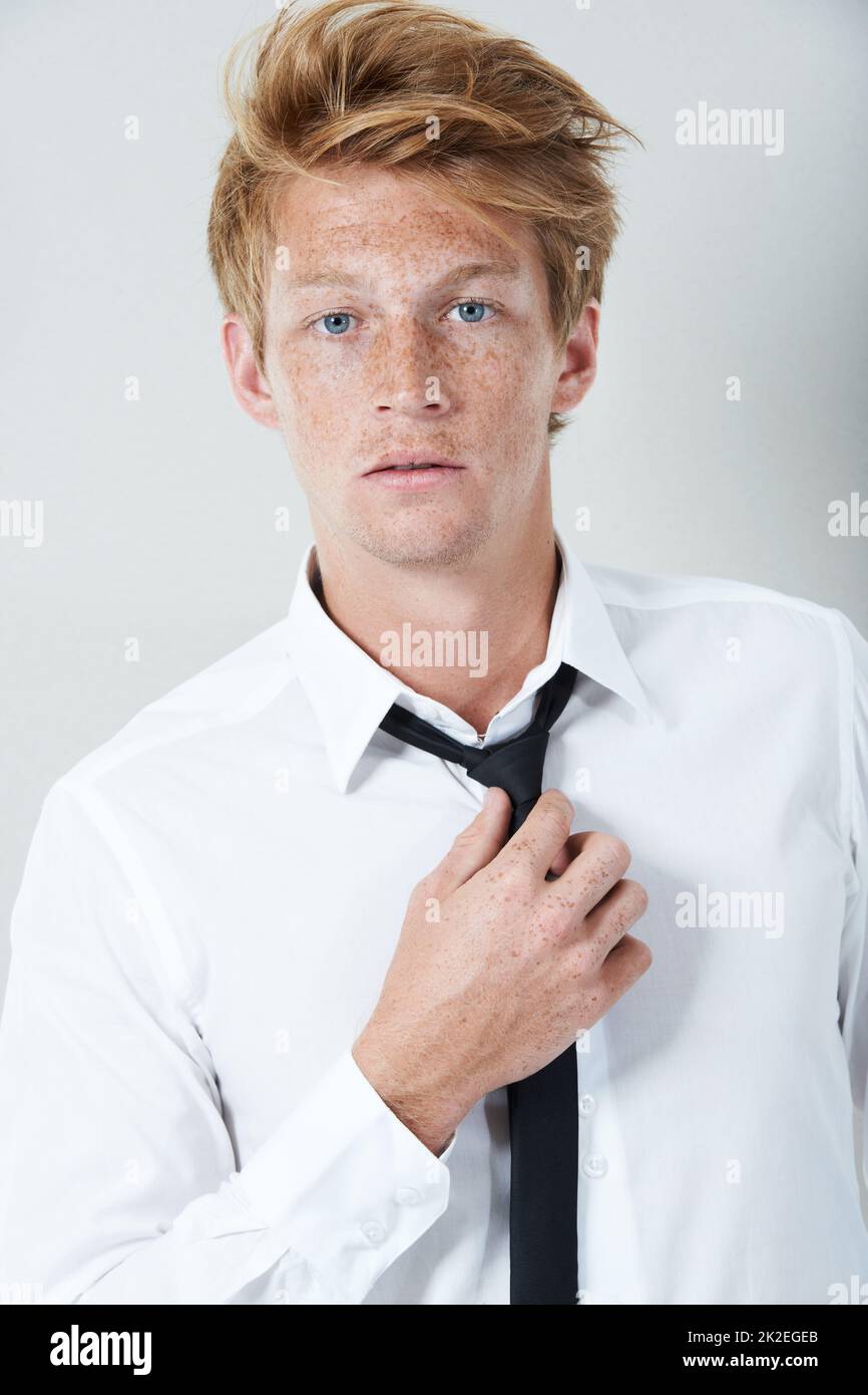 Mr Cool. Studio portrait of a young man staring at the camera. Stock Photo