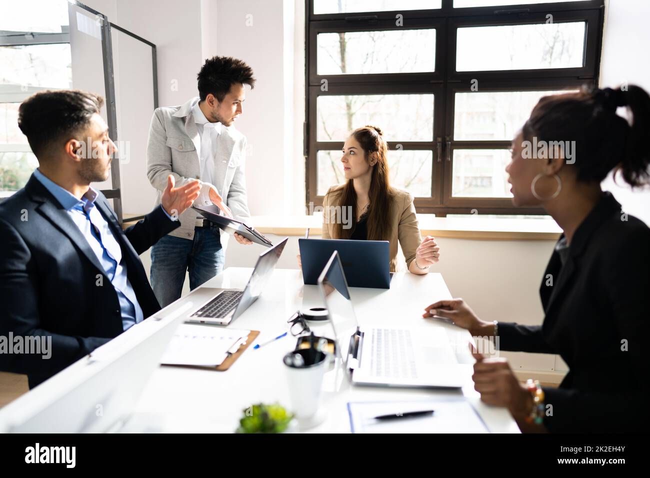 Diverse Bored Meeting Training Presentation Stock Photo