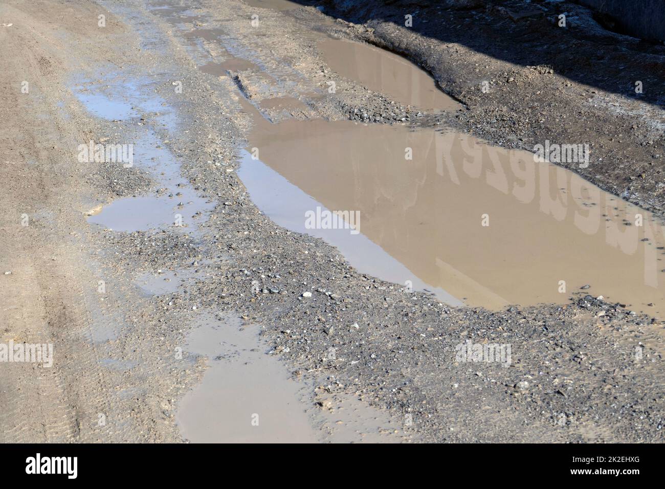 mud and dirty water puddle formed as a result of rain Stock Photo Alamy