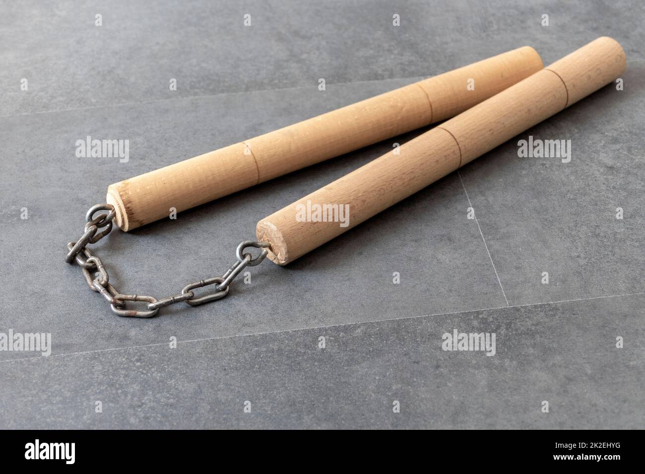 nunchaku made of wood and chain used in china and japan Stock Photo Alamy