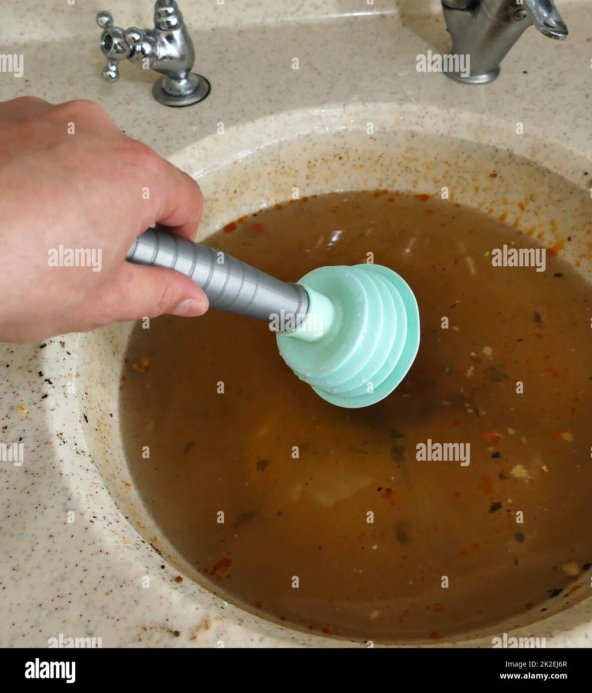 clogging in the kitchen sinkdirty dishwater accumulated in the sinka