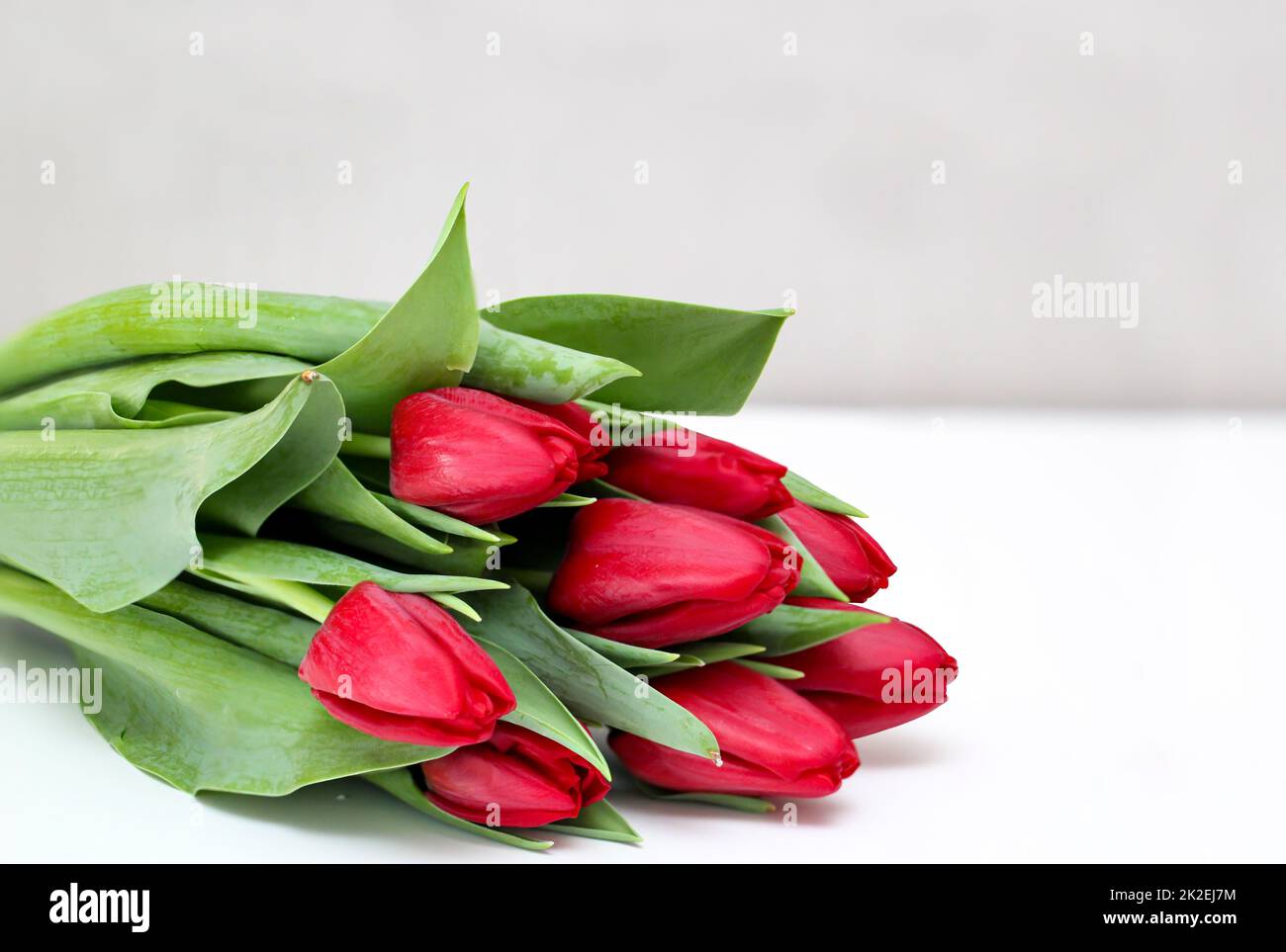 Close up of bouquet with beautiful tulips for Valentine's Day. Stock Photo
