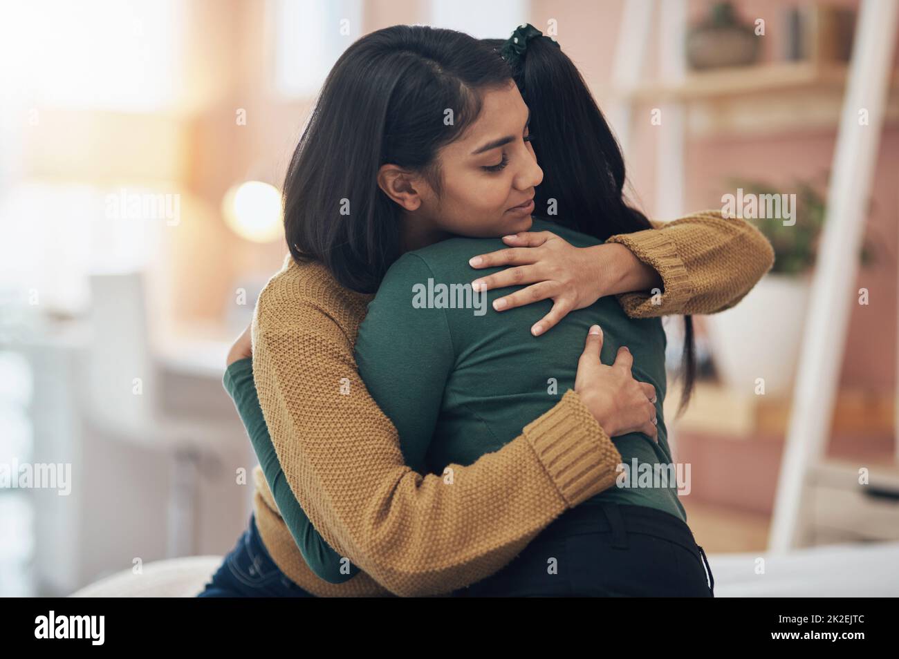 Ill always be here to support her. Cropped shot of two young women embracing each other at home. Stock Photo