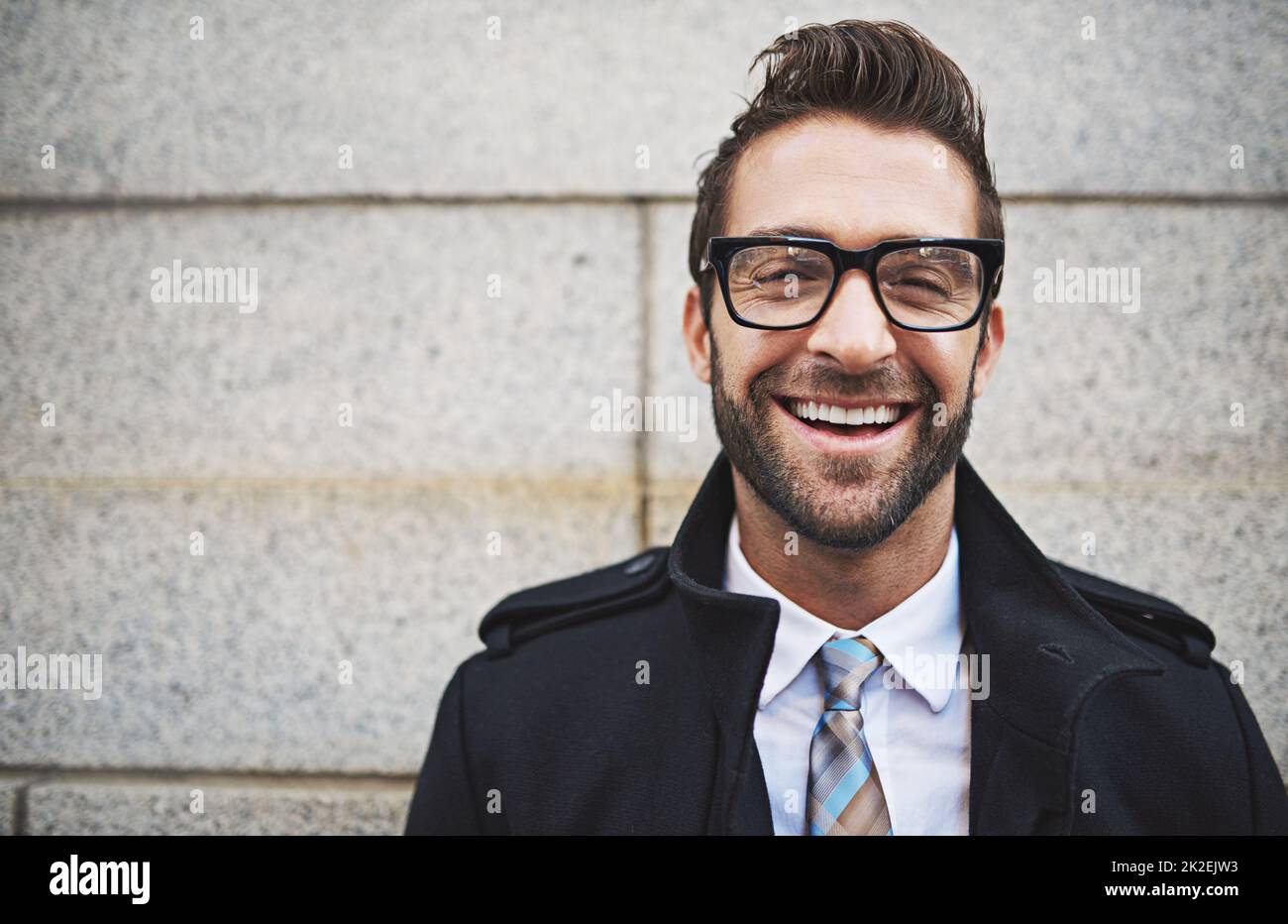 Personable meets professional style. Portrait of a stylish young businessman in the city. Stock Photo