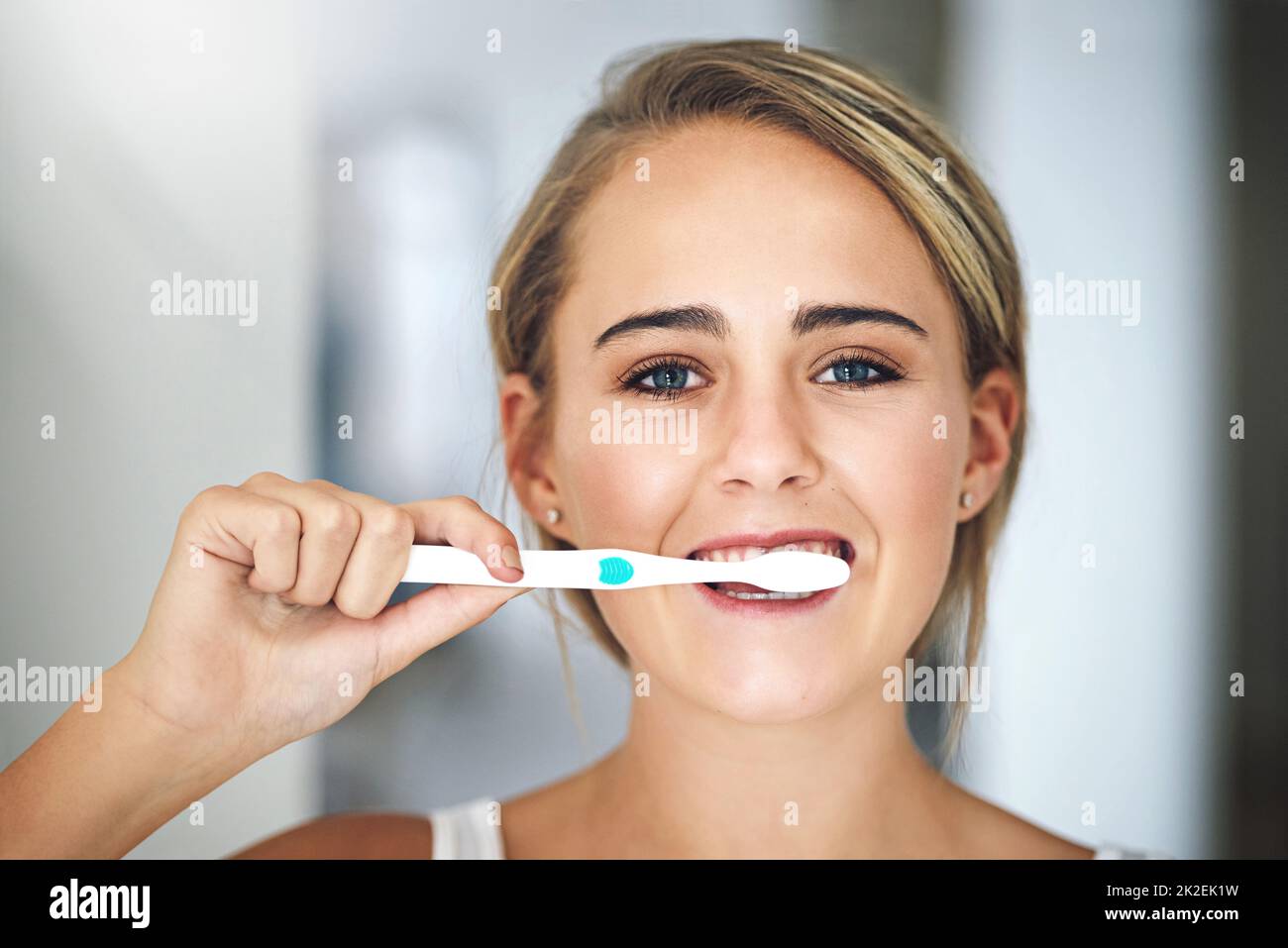Make good hygiene a habit. Portrait of an attractive young woman