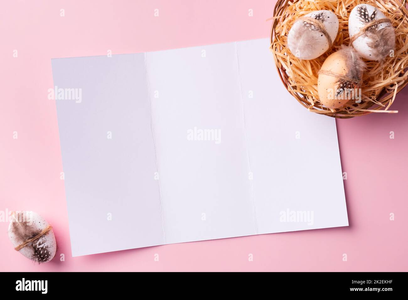 Happy Easter greeting card mock up. Empty card with decorative Easter eggs Stock Photo