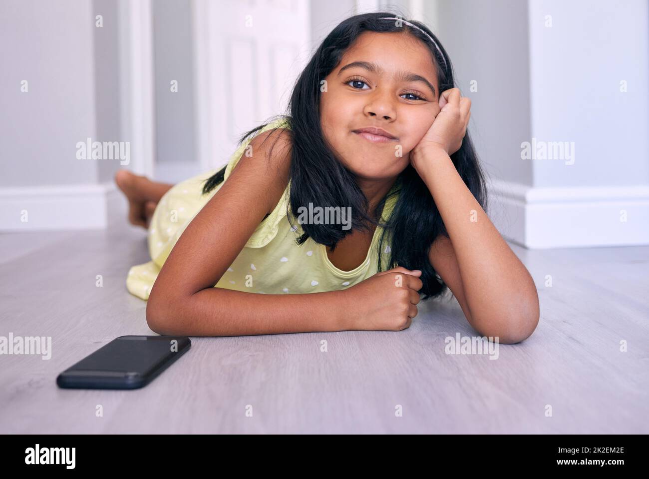 Five more minutes to go to screen time. Shot of an adorable little girl