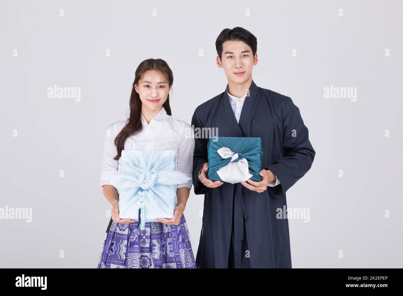 A Korean couple is standing wearing Korean traditional clothes Stock Photo - Alamy A Korean couple is standing wearing Korean traditional clothes Stock Photo - Alamy