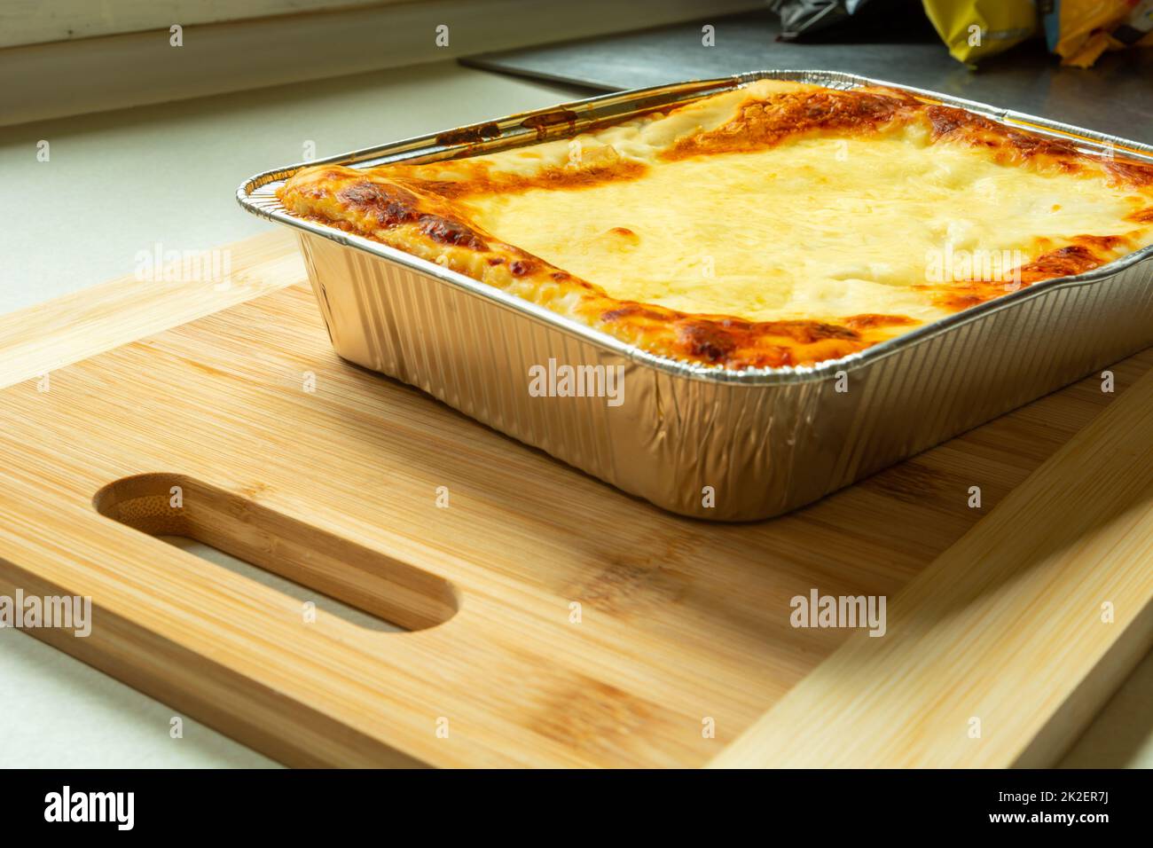 Cakes in foil pans stock photo. Image of homemade, brown - 180386150