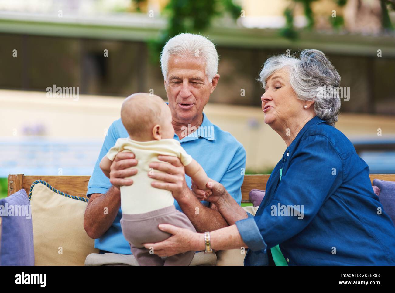 Grandchildren complete lifes circle. Cropped shot of a senior couple spending time with their grandson. Stock Photo