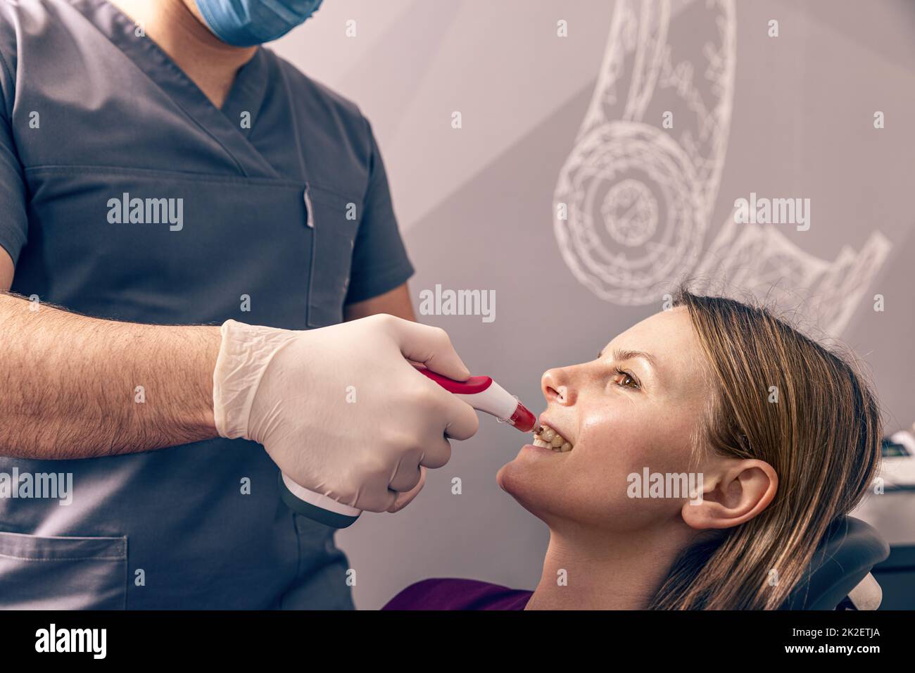 Dentist selecting patients teeth color Stock Photo
