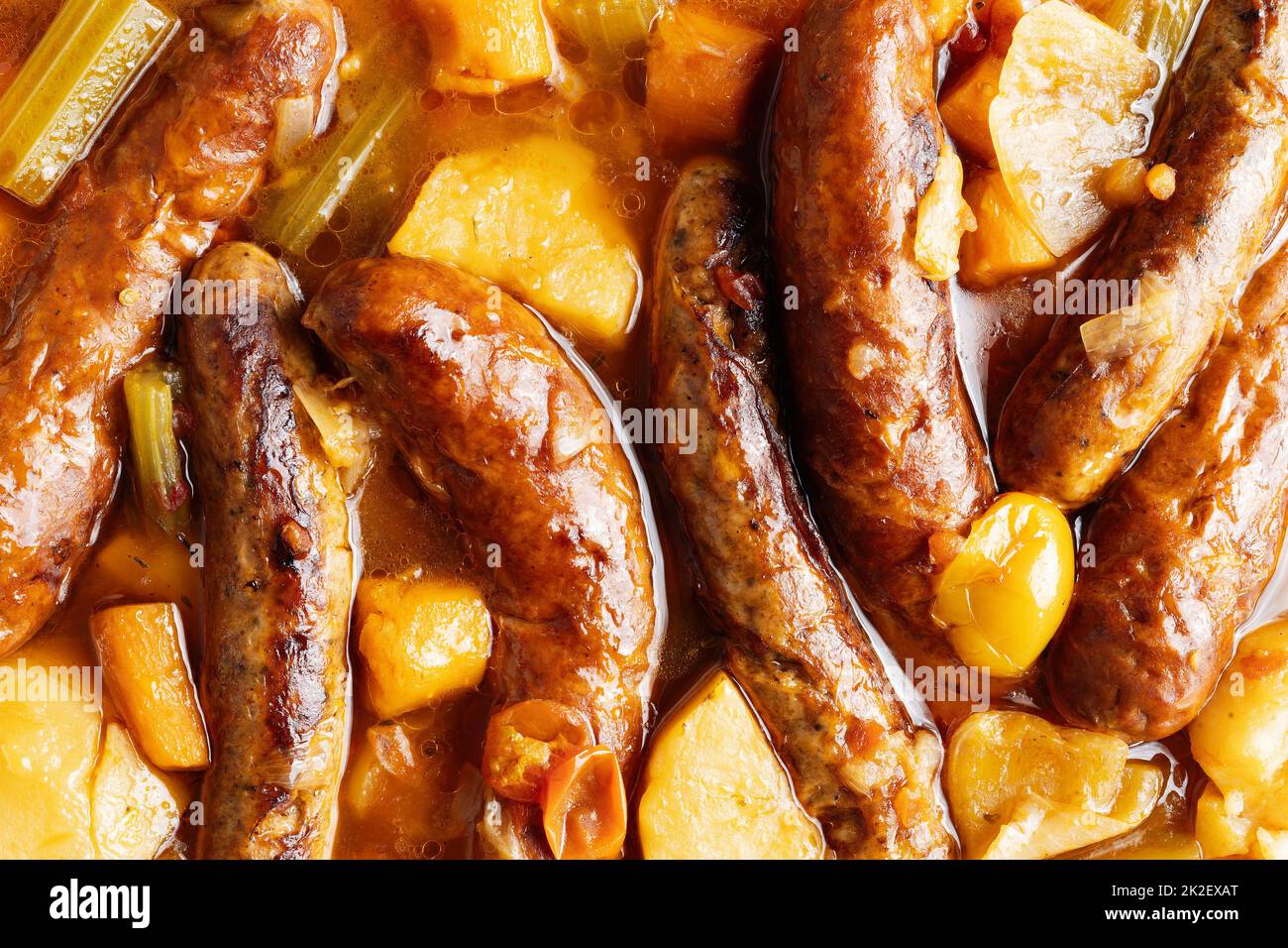 rustic english sausage casserole comfort food background Stock Photo