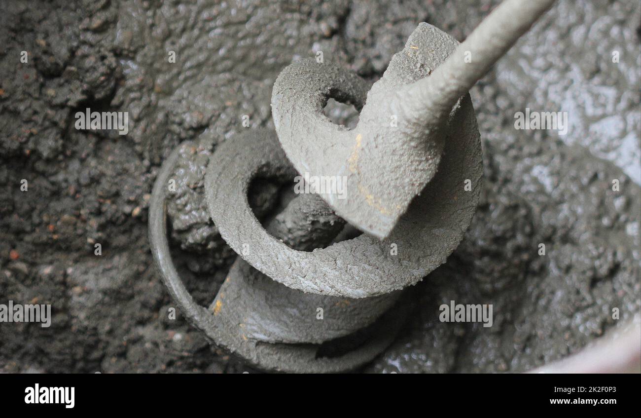 concrete mixing with electrical drill and mixer Stock Photo Alamy