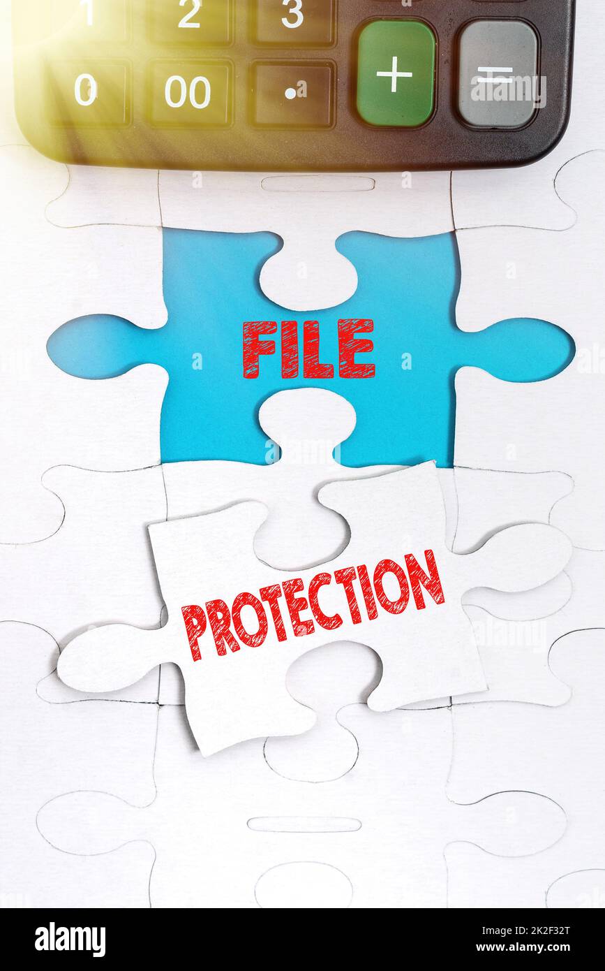 Sign displaying File Protection. Business approach Preventing accidental erasing of data using storage medium Building An Unfinished White Jigsaw Pattern Puzzle With Missing Last Piece Stock Photo