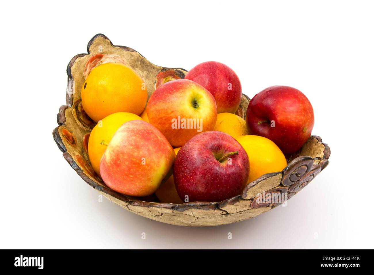 fresh fruits on a clay plate Stock Photo