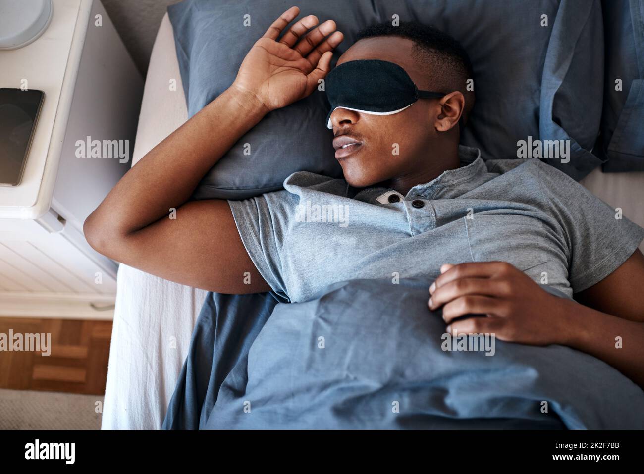 Sleeping in is my favourite pastime. Cropped shot of a handsome young