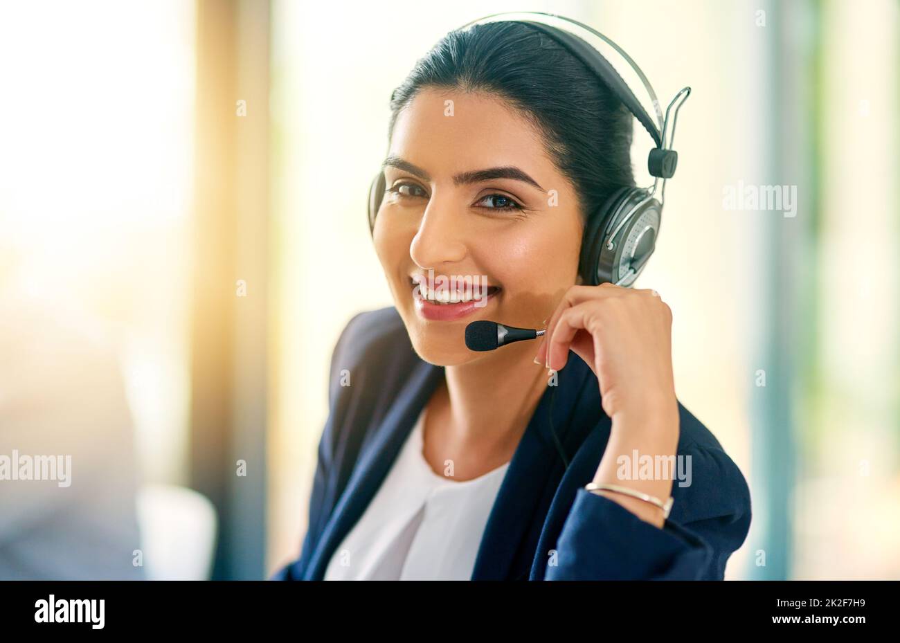 Im always here to help. Cropped portrait of an attractive young female