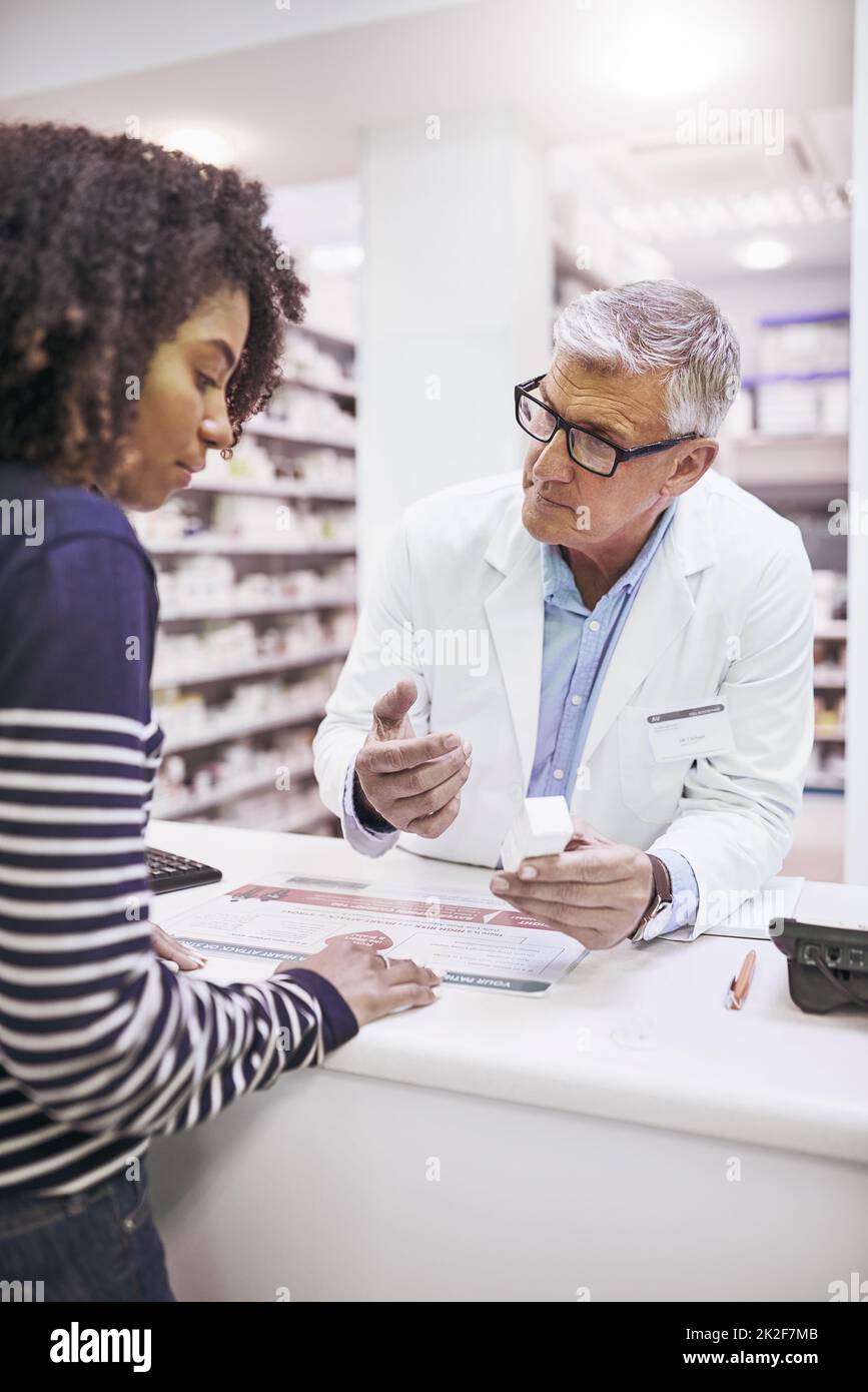 Doctor giving prescription hi-res stock photography and images - Alamy