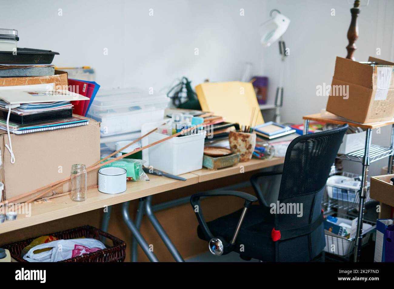 This room needs a clean. Shot of a messy room needing cleaning. Stock Photo
