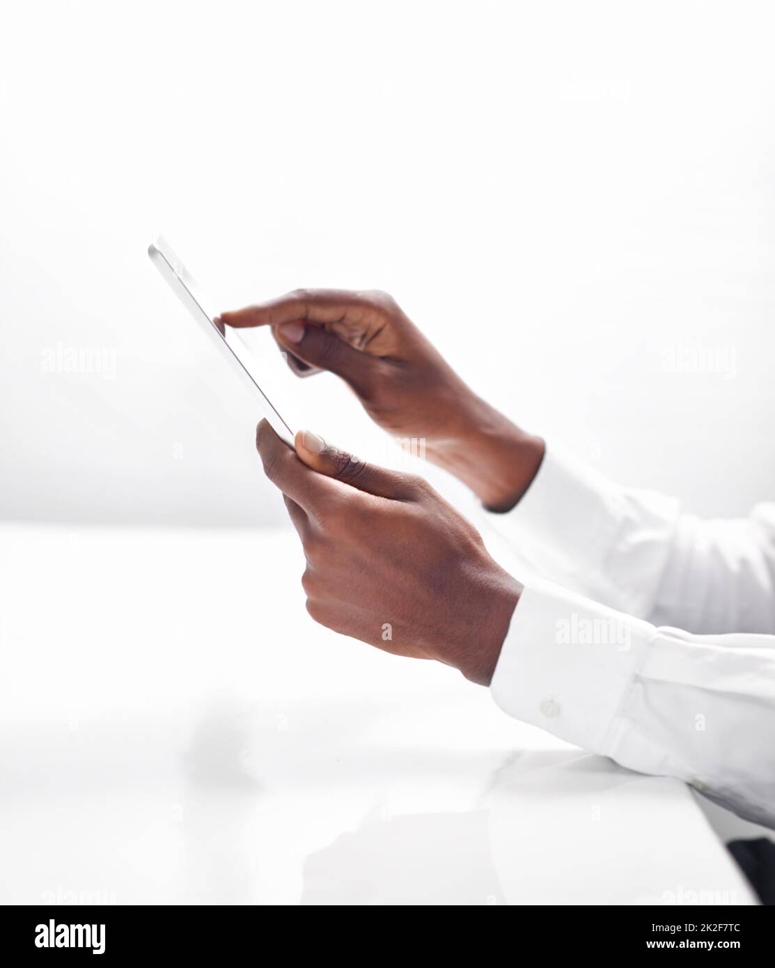 The future is in the touch. a man touching his digital tablet. Stock Photo