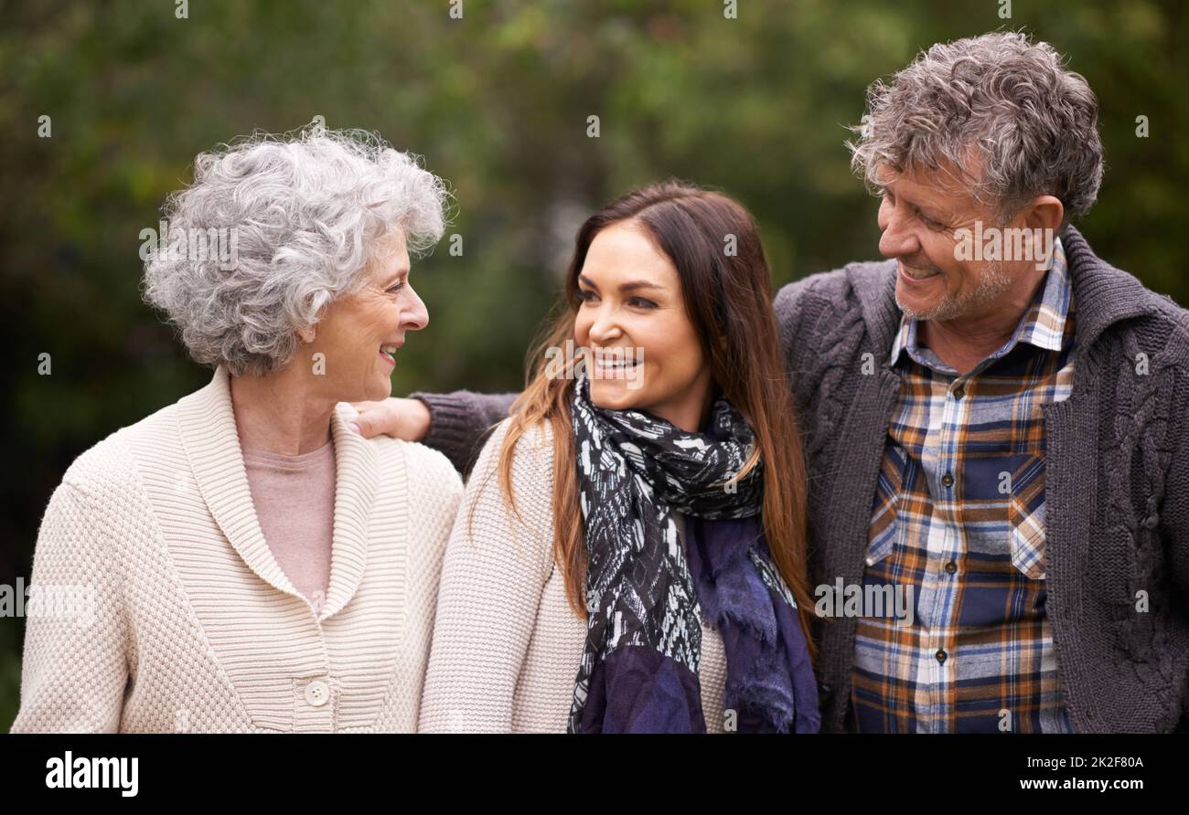 I always make time for my parents. Shot of a beautiful woman spending time with her senior parents. Stock Photo