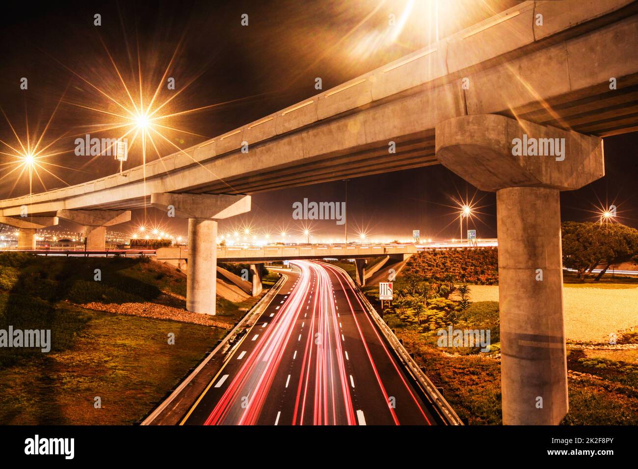 Lights in a busy city. Shot of a traffic on the motorway. Stock Photo