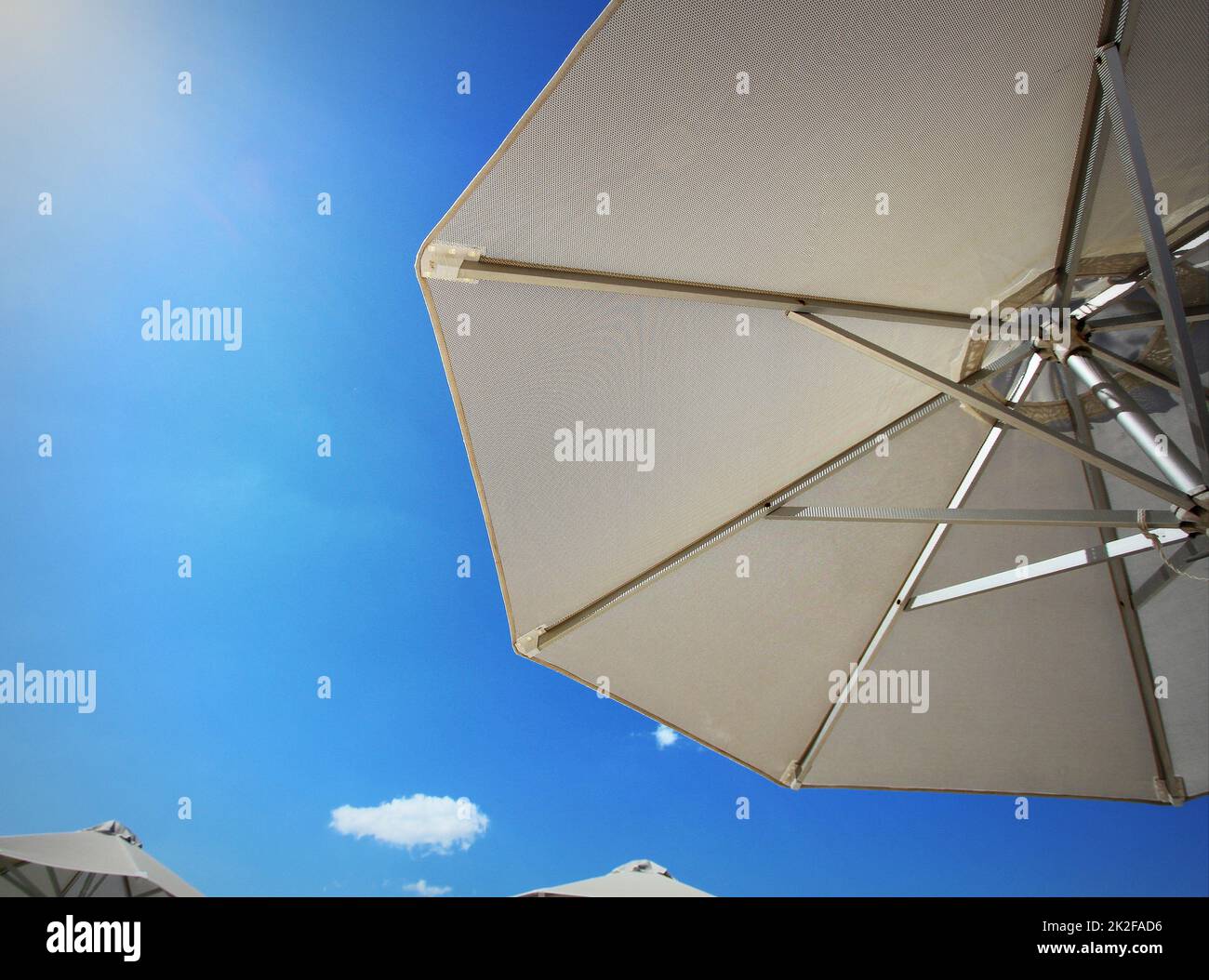 Bright sun umbrellas on the beach Stock Photo Alamy