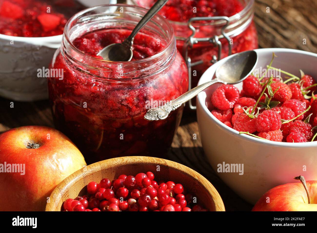 Raspberry, cranberry, apple jam Stock Photo - Alamy