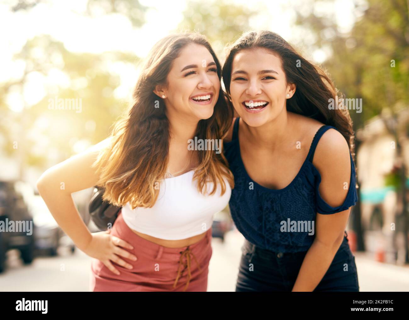 Live, love and laugh with your best friend. Portrait of two female best friends spending the day together in the city. Stock Photo