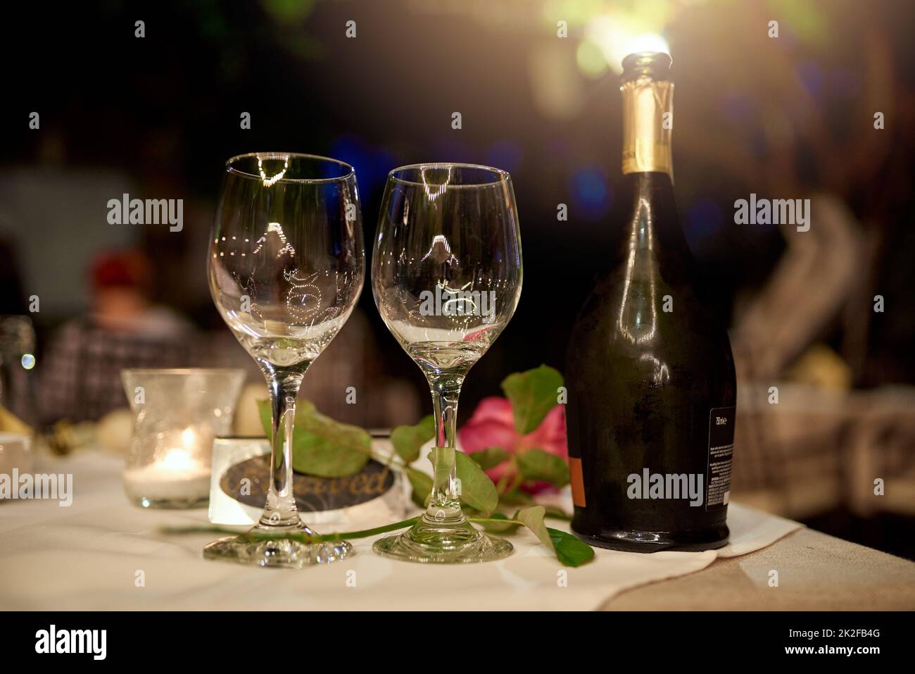 Romance is just waiting to happen. Cropped shot of a romantic dinner setting. Stock Photo