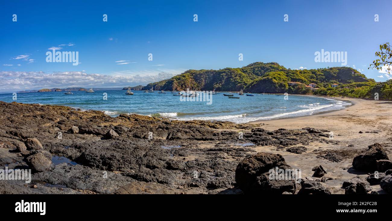 Playa Ocotal and Pacific ocean waves on rocky shore, El Coco Costa Rica ...