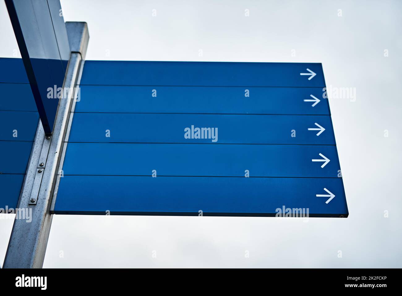 Look no further cropped shot of blank directional road signs stock