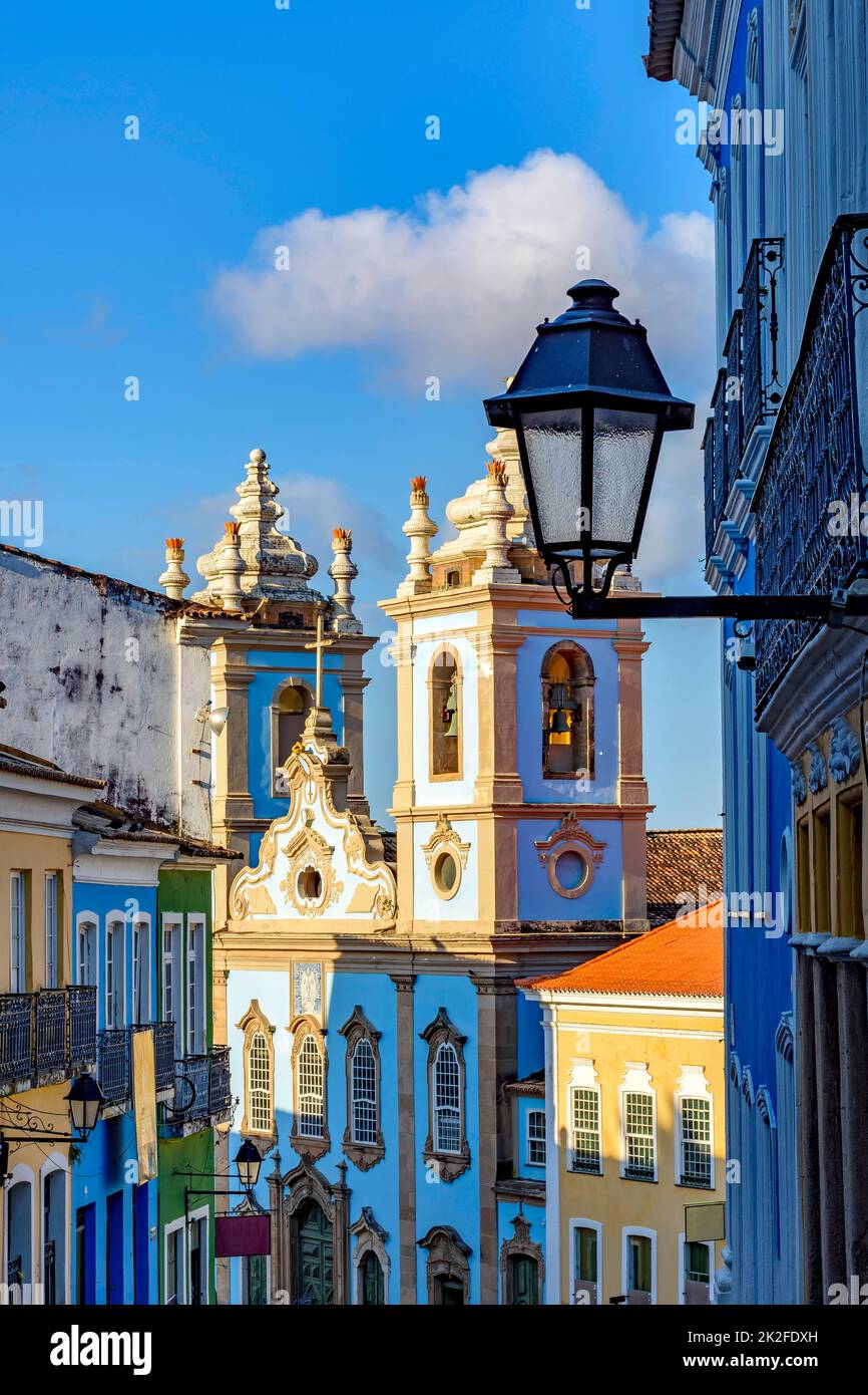 Colorful colonial houses facades and historic church towers in baroque and colonial style Stock Photo