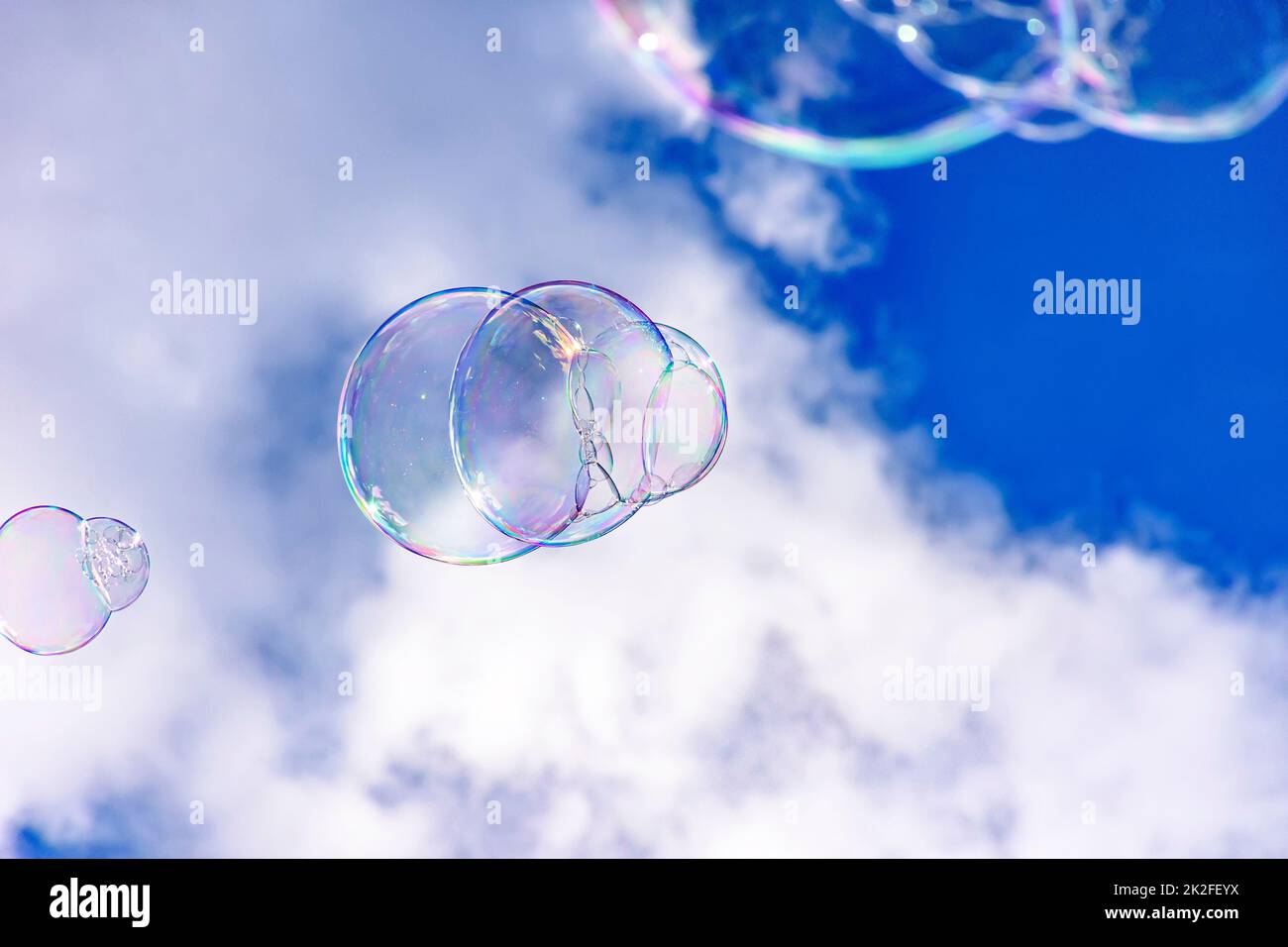 Soap bubbles with clouds Stock Photo Alamy